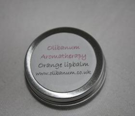 Orange lip balm tin 10ml.