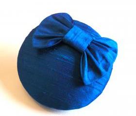 Silk bow cocktail hat, peacock blue.
