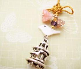 Phone charm with Chinese knot, shell bird and Czech glass flowers - Palace Garden