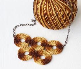 Crochet necklace brown rust yellow marbled olympic circles quintette fiber art epictt therougett efpteam tbteam