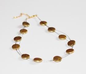 Gold and black discs floating multi strand illusion necklace