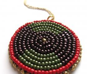 Bead embroidered red, gold olive and purple pendant necklace with gold chain