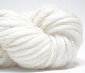 Handspun super bulky yarn in undyed thick and thin merino wool - 50 yards, 2.7 ounces/ 77 grams 