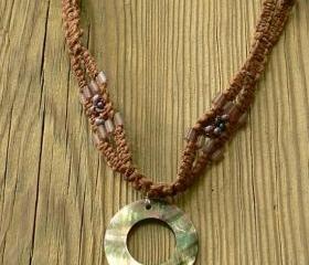 Extra long macrame hemp necklace with a Mother of Pearl pendant