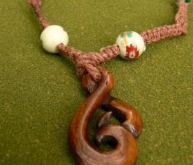Knotted hemp necklace with twisted wooden pendant