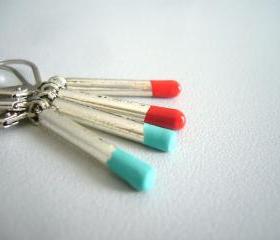 Match stick earrings, red and teal earrings