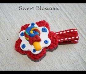 crochet flower hair clip topped up with polymer clay bead 