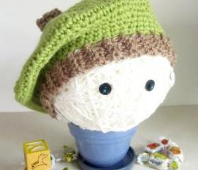 Crochet kids tam hat in green and oatmeal
