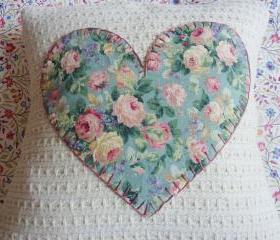 Hand made cushion with vintage heart detail.