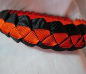 Braided ribbon headband in orange and black