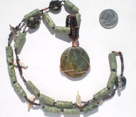 statement necklace in greens and browns