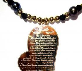  Black Iridescent Freshwater Pearl with gold filled accentuated by a gold Filled heart shaped medal (Apostle creed).