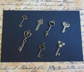 Seven Antique Bronze Key Charms