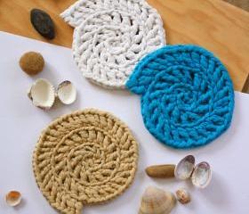 Recycled T-shirt fabric crocheted shell shaped coasters: white, blue, light brown.