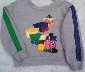 Boys appliqued sweatsuit Size 4 to 5
