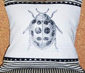 Decorative throw pillow cushion cover with lady bug screen print in black