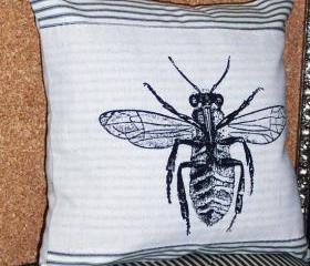 Decorative throw pillow with bee screen print design