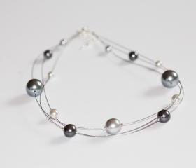 Grey glass pearl floating multi strand illusion necklace.