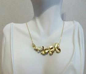 Delicate Gold Cascading Orchid Necklace