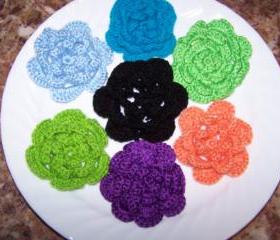 Two alligator clips with crochet flower.