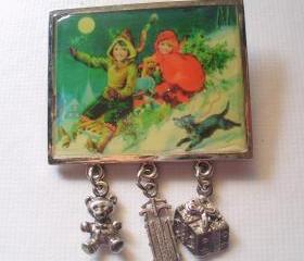 vintage christmas picture pin, children sledding with charm dangles