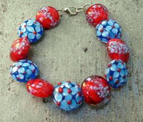 red and turquoise lampworked art bead bracelet