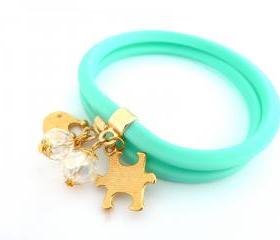 Set of 2 Thick Rubber Tube Bracelets with Gold Plated Charms and crystal beads