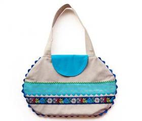 Linen bag with blue appliqué ribbons