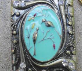 enameled bird locket with beaded chain