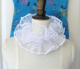 White organza pierette neck ruffle.