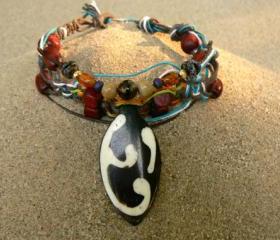 Surfer bracelet with bone pendant