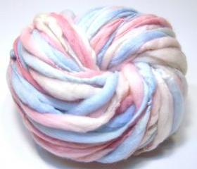 50 yards and 2.6 ounces handspun yarn in thick and thin merino wool