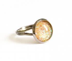 Yellow orange sparkling iridescent ring with glitters and glass cabochon, adjustable