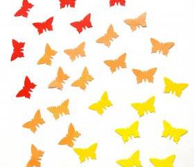 100 handpunched butterflies in the shades of yellow, orange and red