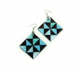 Laminated Earrings - optical abstract contemporary art. Black and teal triangles.