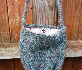 large side sash crochet purse in turquoise neutral with pink flannel birds lining
