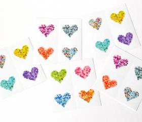 20 round glossy stickers with colorful hearts
