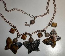 Stone butterfly necklace with quartz beads and copper