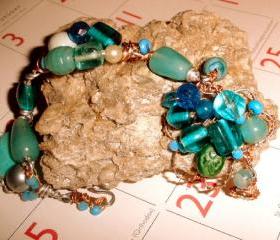 Asymetrical green bracelet FREE SHIPPING with beads copper wire wrapping