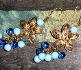 Bronze flower earrings with blue beads