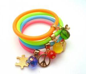 Rubber Bracelets/Set of 4 Neon Rubber Bracelets with Gold plated Charms and faceted beads,orange/blue/green/fuchsia