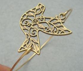 pigeon Brass Bangle Bracelet