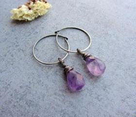 Oxidized sterling silver hoop earrings with a purple amethyst teardrop gemstones.