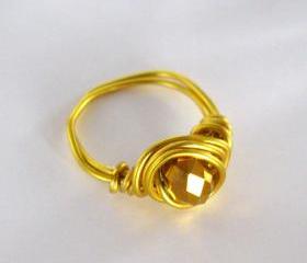 Pick your size: Gold wire wrapped ring with bronze bead