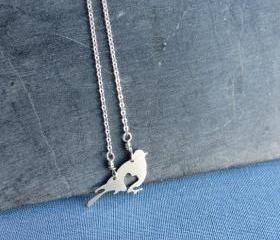 Sterling silver bird and heart necklace. Valentines Day love pendant