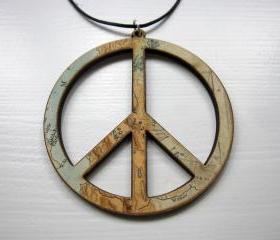lasercut wooden map pendants - world-peace
