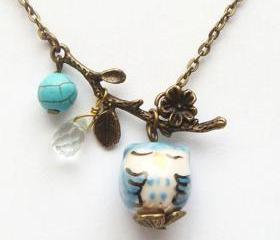 Antiqued Brass Leaf Turquoise Quartz Porcelain Owl Necklace