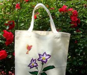 Tote Bag With Violet Flowers and a Red and Yellow Butterfly