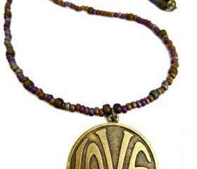 LOVE necklace. Purple & gold. Brass metal love circle pendant with glass seed beads. Beaded necklace. Boho. Hippie. simple.