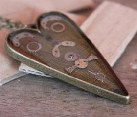 Pretty steampunk style heart-shaped pendant
